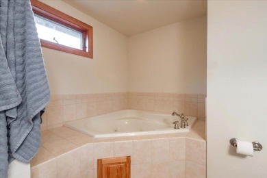 Executive style living can be yours in this Penthouse at on Northern Bay Golf Resort and Marina in Wisconsin - for sale on GolfHomes.com, golf home, golf lot