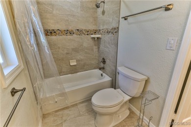 This spacious 3-bedroom 2-bath home is located in the heart of on Plantation Inn and Golf Resort  in Florida - for sale on GolfHomes.com, golf home, golf lot