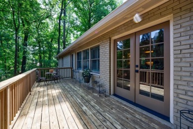 Stunning home with a rocking chair front porch on a friendly on Bobby Jones Golf Club in Georgia - for sale on GolfHomes.com, golf home, golf lot