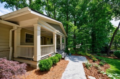 Stunning home with a rocking chair front porch on a friendly on Bobby Jones Golf Club in Georgia - for sale on GolfHomes.com, golf home, golf lot