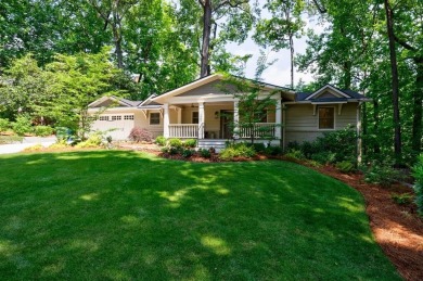 Stunning home with a rocking chair front porch on a friendly on Bobby Jones Golf Club in Georgia - for sale on GolfHomes.com, golf home, golf lot