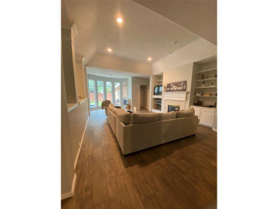 This single-story home, situated in a cul-de-sac, features three on The Golf Club at Fossil Creek in Texas - for sale on GolfHomes.com, golf home, golf lot