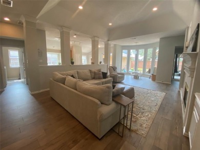 This single-story home, situated in a cul-de-sac, features three on The Golf Club at Fossil Creek in Texas - for sale on GolfHomes.com, golf home, golf lot