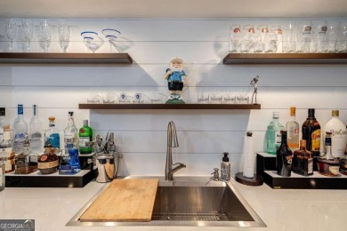 Nestled within the prestigious Georgia Club, this stunning on The Georgia Club in Georgia - for sale on GolfHomes.com, golf home, golf lot