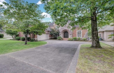 Classic and stately Chenal home with its brick and stone on Chenal Country Club - Bear Den Mountain in Arkansas - for sale on GolfHomes.com, golf home, golf lot