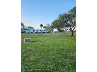 Updated 1st floor condo with golf course views on 5th green on Leisureville Community Association in Florida - for sale on GolfHomes.com, golf home, golf lot