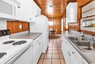 Adorable beach cottage situated just one short block (450 feet) on Beachwood Golf Club in South Carolina - for sale on GolfHomes.com, golf home, golf lot
