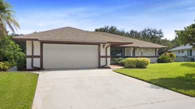 Charming CBS home in Country Club Cove, a quiet community of on Miles Grant Country Club in Florida - for sale on GolfHomes.com, golf home, golf lot