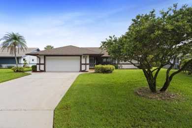 Charming CBS home in Country Club Cove, a quiet community of on Miles Grant Country Club in Florida - for sale on GolfHomes.com, golf home, golf lot