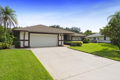 Charming CBS home in Country Club Cove, a quiet community of on Miles Grant Country Club in Florida - for sale on GolfHomes.com, golf home, golf lot
