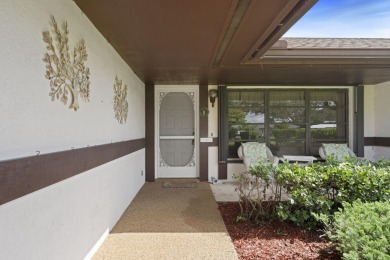 Charming CBS home in Country Club Cove, a quiet community of on Miles Grant Country Club in Florida - for sale on GolfHomes.com, golf home, golf lot