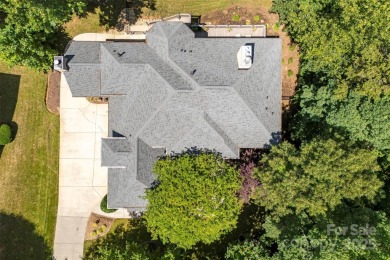 Stunning 5700 SF custom home on private wooded lot overlooking on Skybrook Golf Club in North Carolina - for sale on GolfHomes.com, golf home, golf lot