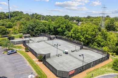 Stunning 5700 SF custom home on private wooded lot overlooking on Skybrook Golf Club in North Carolina - for sale on GolfHomes.com, golf home, golf lot