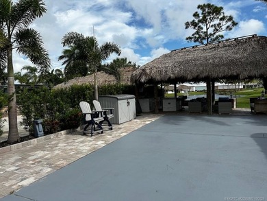 Prime Lakefront Lot with Golf Course Views - Fully Furnished! on Motorcoach Resort Golf Course in Florida - for sale on GolfHomes.com, golf home, golf lot