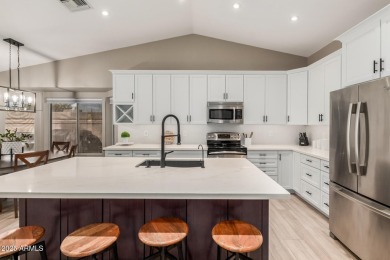 Welcome to this beautifully updated 3-bedroom, 2-bath home in on The Legend at Arrowhead in Arizona - for sale on GolfHomes.com, golf home, golf lot