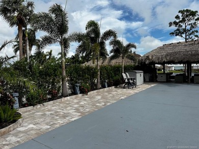 Prime Lakefront Lot with Golf Course Views - Fully Furnished! on Motorcoach Resort Golf Course in Florida - for sale on GolfHomes.com, golf home, golf lot