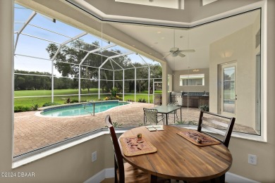 Step inside and WOW what a view!! Very well maintained, light on Halifax Plantation Golf Club in Florida - for sale on GolfHomes.com, golf home, golf lot