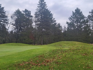 Garland Lodge & Golf Resort, located in Lewiston is on over 3 on Garland Resort and Golf Club  in Michigan - for sale on GolfHomes.com, golf home, golf lot