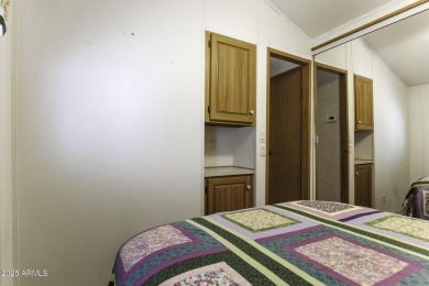 Welcome to your own private retreat in this stunning 1 bedroom on Palm Creek Golf and RV Resort in Arizona - for sale on GolfHomes.com, golf home, golf lot