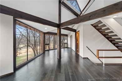 Discover a fully remodeled prime investment opportunity on Seasons Ridge At Four Seasons in Missouri - for sale on GolfHomes.com, golf home, golf lot