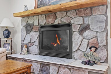 This spacious 3-bedroom, 2-bath ranch offers over 2,000 square on Canadian Lakes Country Club-The Royal Course in Michigan - for sale on GolfHomes.com, golf home, golf lot