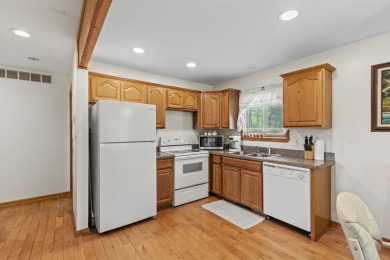 This spacious 3-bedroom, 2-bath ranch offers over 2,000 square on Canadian Lakes Country Club-The Royal Course in Michigan - for sale on GolfHomes.com, golf home, golf lot
