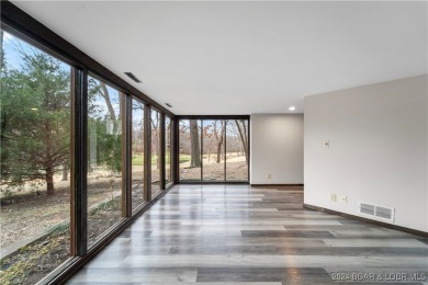 Discover a fully remodeled prime investment opportunity on Seasons Ridge At Four Seasons in Missouri - for sale on GolfHomes.com, golf home, golf lot