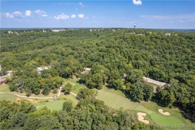 Discover a fully remodeled prime investment opportunity on Seasons Ridge At Four Seasons in Missouri - for sale on GolfHomes.com, golf home, golf lot