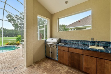 Step inside and WOW what a view!! Very well maintained, light on Halifax Plantation Golf Club in Florida - for sale on GolfHomes.com, golf home, golf lot