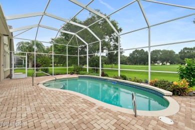 Step inside and WOW what a view!! Very well maintained, light on Halifax Plantation Golf Club in Florida - for sale on GolfHomes.com, golf home, golf lot