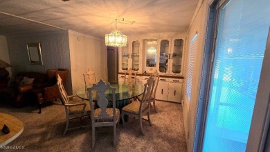 Charming Manufactured Home on Private Golf Course Lot in Riviera on Riviera Golf Club in Florida - for sale on GolfHomes.com, golf home, golf lot