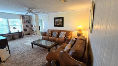 Charming Manufactured Home on Private Golf Course Lot in Riviera on Riviera Golf Club in Florida - for sale on GolfHomes.com, golf home, golf lot