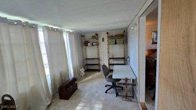Charming Manufactured Home on Private Golf Course Lot in Riviera on Riviera Golf Club in Florida - for sale on GolfHomes.com, golf home, golf lot