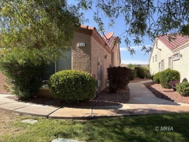 This charming two-bedroom, two-bath townhome in Sunset Greens on CasaBlanca Resort and Casino in Nevada - for sale on GolfHomes.com, golf home, golf lot