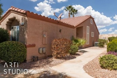 This charming two-bedroom, two-bath townhome in Sunset Greens on CasaBlanca Resort and Casino in Nevada - for sale on GolfHomes.com, golf home, golf lot