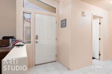 This charming two-bedroom, two-bath townhome in Sunset Greens on CasaBlanca Resort and Casino in Nevada - for sale on GolfHomes.com, golf home, golf lot