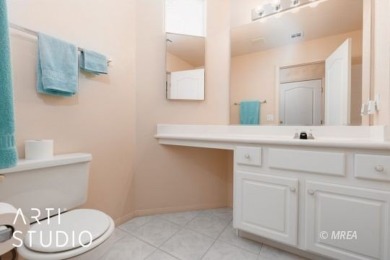 This charming two-bedroom, two-bath townhome in Sunset Greens on CasaBlanca Resort and Casino in Nevada - for sale on GolfHomes.com, golf home, golf lot