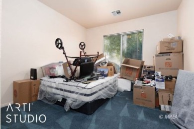 This charming two-bedroom, two-bath townhome in Sunset Greens on CasaBlanca Resort and Casino in Nevada - for sale on GolfHomes.com, golf home, golf lot