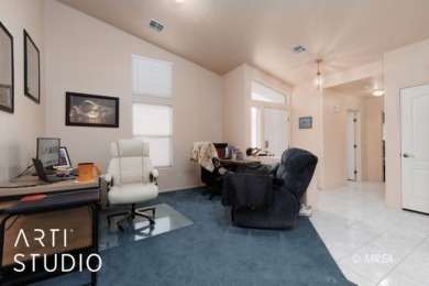 This charming two-bedroom, two-bath townhome in Sunset Greens on CasaBlanca Resort and Casino in Nevada - for sale on GolfHomes.com, golf home, golf lot