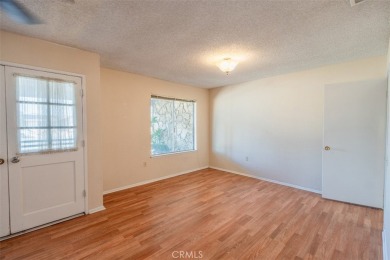 This inviting single-family home offers 2 bedrooms and 2 full on Cherry Hills Golf Club in California - for sale on GolfHomes.com, golf home, golf lot