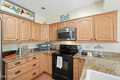 Discover peaceful Florida living in this well-maintained on The Grand Club - Pine Lakes Course in Florida - for sale on GolfHomes.com, golf home, golf lot