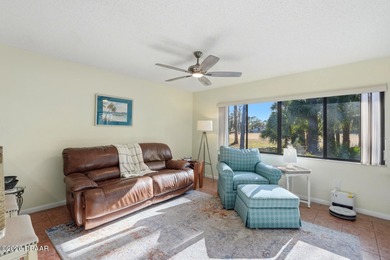 Discover peaceful Florida living in this well-maintained on The Grand Club - Pine Lakes Course in Florida - for sale on GolfHomes.com, golf home, golf lot