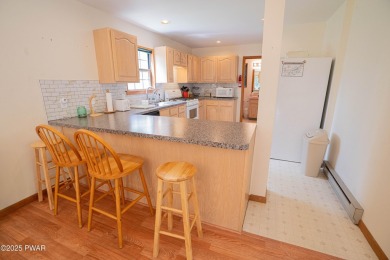 Discover this beautifully maintained contemporary home in The on The Hideout Golf in Pennsylvania - for sale on GolfHomes.com, golf home, golf lot