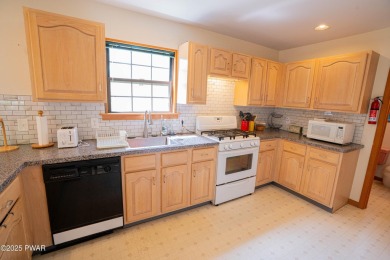 Discover this beautifully maintained contemporary home in The on The Hideout Golf in Pennsylvania - for sale on GolfHomes.com, golf home, golf lot