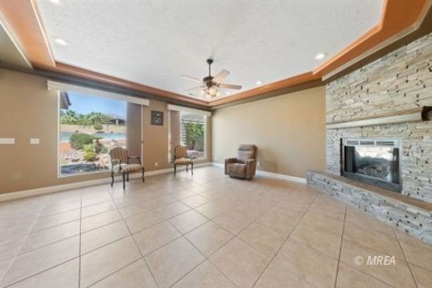 This beautifully designed home sits on a desirable corner lot on The Oasis Golf Club in Nevada - for sale on GolfHomes.com, golf home, golf lot