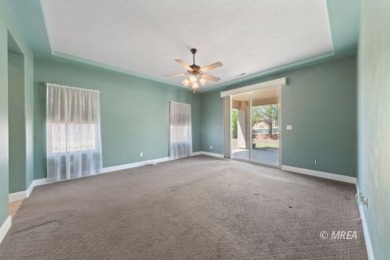 This beautifully designed home sits on a desirable corner lot on The Oasis Golf Club in Nevada - for sale on GolfHomes.com, golf home, golf lot