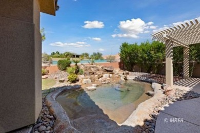 This beautifully designed home sits on a desirable corner lot on The Oasis Golf Club in Nevada - for sale on GolfHomes.com, golf home, golf lot