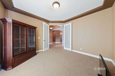 This beautifully designed home sits on a desirable corner lot on The Oasis Golf Club in Nevada - for sale on GolfHomes.com, golf home, golf lot