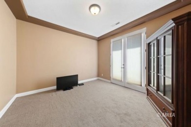 This beautifully designed home sits on a desirable corner lot on The Oasis Golf Club in Nevada - for sale on GolfHomes.com, golf home, golf lot
