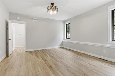 Discover this beautifully designed 2-bedroom, 2 -bath home in on The Jewel Golf Club in Minnesota - for sale on GolfHomes.com, golf home, golf lot